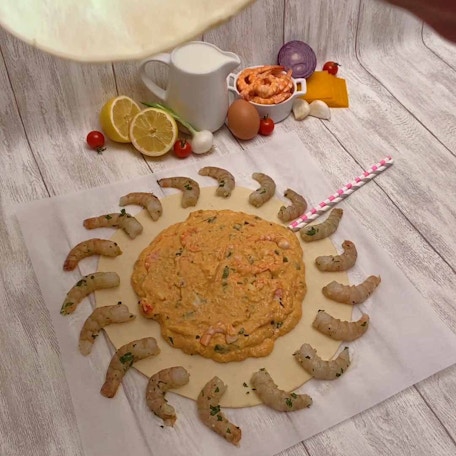 Pizza inflada de camarones